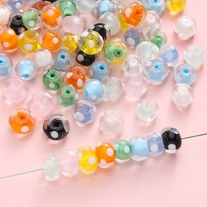 Polka dot lampwork glass beads in various colors for DIY jewelry making and crafts