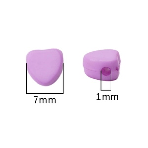 Detail view of 7mm purple heart-shaped acrylic beads with 1mm hole for DIY crafts