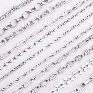 Various styles of silver stainless steel chains including paperclip and coffee bean links