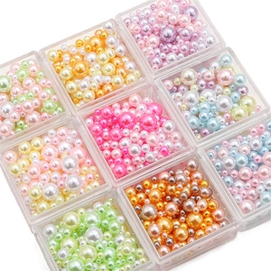 Colorful ABS pearl bead set in nine storage boxes for DIY crafts and jewelry making
