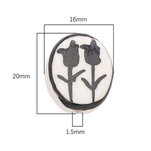 Macro shot of hand-painted ceramic tulip bead with 20mm x 16mm dimensions for DIY jewelry