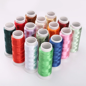 Set of 15 colorful polyester sewing threads in various vibrant shades for DIY crafts