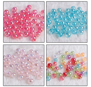Vue détaillée de perles facettées en acrylique AB pour bijoux DIY et chaînes de téléphone