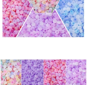 Macro detail of 4mm macaron colored frosted glass seed beads for DIY jewelry making