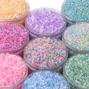 Mix of 4mm colorful glass seed beads in transparent jars for DIY bracelet and jewelry making