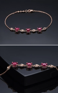 Détail du bracelet en or rose avec rubis ovales et accents de diamants étincelants
