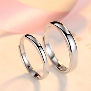 Minimalist silver plated couple rings with polished smooth finish and adjustable open band