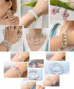 Detail of DIY jewelry kit with pastel beads, pearls, and heart charms for necklaces