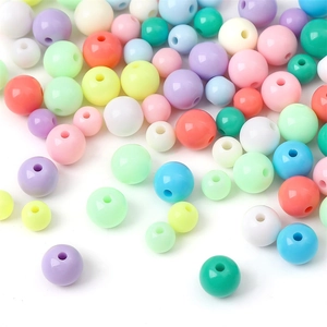 Macro shot of colorful acrylic round beads for DIY handmade bracelet jewelry making