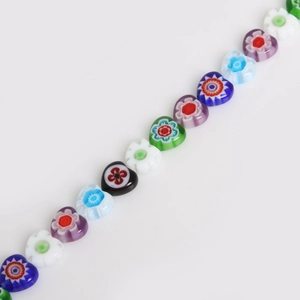Colorful Millefiori heart-shaped glass beads for DIY jewelry making on white background