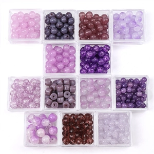 Assorted purple glass crystal beads set in 13 storage boxes for DIY jewelry making