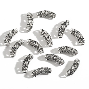Set of 12 vintage silver alloy curved tube spacer beads with intricate hollow floral designs