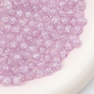 Macro view of lavender crackled glass round beads for DIY jewelry making and crafting
