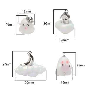 Detailed size view of resin Halloween ghost, moon, and house charms for DIY jewelry making