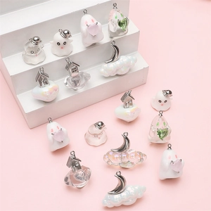 Resin Halloween pendants with cloud, moon, and ghost charms for DIY jewelry making