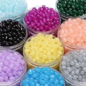 Colorful cylindrical glass jade beads in transparent round boxes for DIY jewelry making
