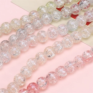 Detailed macro shot of floral ice-crackled glass beads for DIY bracelet making