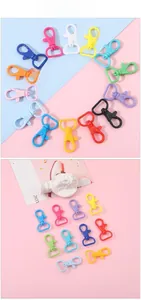 Macro detail of colorful 360-degree rotating plastic lobster clasps for DIY jewelry making