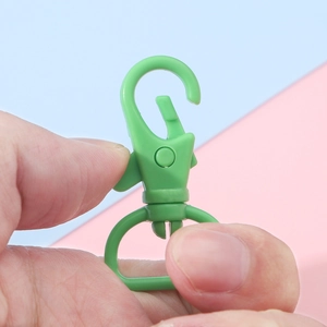Vibrant lime green 360-degree rotating plastic swivel snap hook for DIY keychains and lanyards