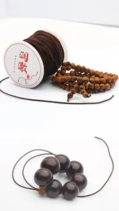 Bruine elastische koordspoel voor DIY-sieraden met houten kralenarmband