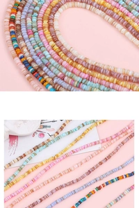 Macro-opname van gekleurde platte schelp heishi kralen voor DIY bohemian sieraden maken