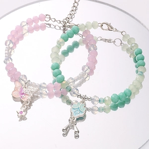 Double-layer beaded bracelets with pink butterfly and cyan Ruyi cloud charms on mirror surface