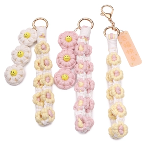 Handmade woven daisy keychain with cotton rope flower and gold lobster clasp