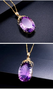 Macro detail of oval cut purple amethyst pendant with 18K gold plating and pavé diamonds