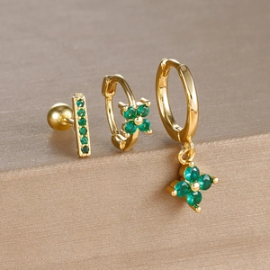 Detailed set of gold four-leaf clover earrings with sparkling green zircon inlays
