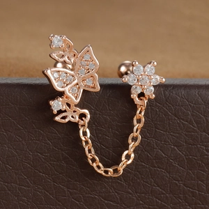 Boucles d'oreilles fleur et papillon en or rose avec chaîne pour double perçage et zircon