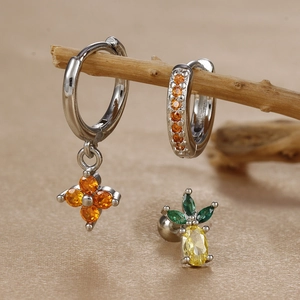 Detailed set of silver earrings with orange cross pendant and pineapple stud jewelry