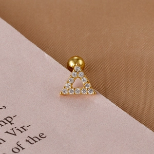 Detail of golden triangle cartilage earring with sparkling zircons and screw back