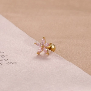 Detail of pink marquise zircon flower cartilage stud earring with golden screw back ball