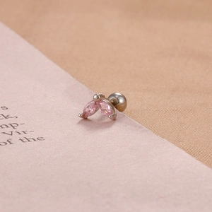 Macro shot of pink marquise zircon butterfly stud earring with silver screw back ball