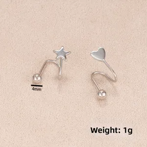 Detail of silver spiral earrings featuring star and heart charms with 4mm ball ends