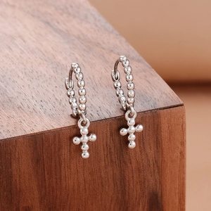Minimalist stainless steel cross hoop earrings with textured bead design for women