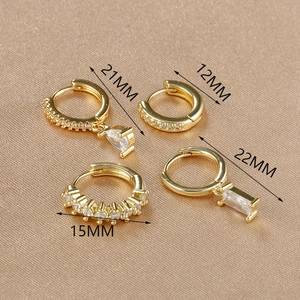 Elegant gold zircon earrings set featuring rectangular and teardrop pendants with dimensions