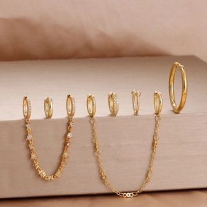 Close-up of gold-plated S925 sterling silver hoop earrings with zircon and chains