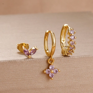 Three-piece gold plated stainless steel piercing set with purple zircon butterfly and flower