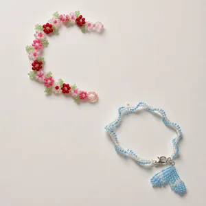 Handmade seed bead flower bracelet and blue fishtail necklace with lobster clasp