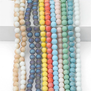 Macro shot of colorful matte glass sand beads for DIY jewelry and hairpins
