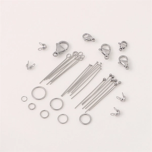 Macro shot of stainless steel lobster clasps, jump rings and jewelry pins for DIY bracelets
