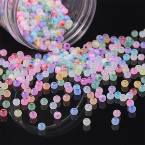 Close-up of pastel candy-colored frosted beads with translucent matte texture for DIY jewelry