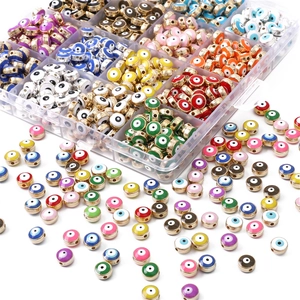 Flat round evil eye resin beads set in multiple colors with transparent storage box
