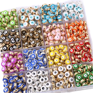 DIY colorful resin Evil Eye bead charms with gold metal frame in clear 15-grid storage box