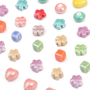 Mix of colorful ceramic flower and heart beads for DIY jewelry and necklace making