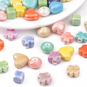 Colorful ceramic beads set in macaron colors including heart, star and flower shapes