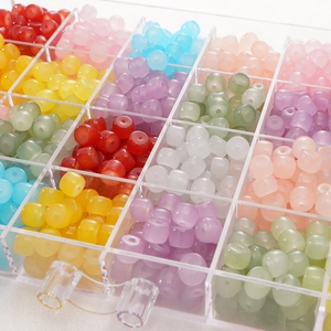 8x6mm frosted glass barrel beads set in a 24-grid organizer box for DIY jewelry making