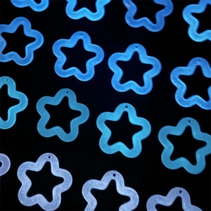 Luminous acrylic star charms in blue and white glow for DIY jewelry making and crafts
