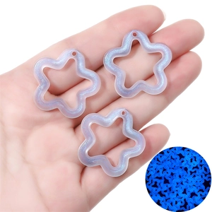 Luminous purple acrylic star charms for DIY jewelry making with glitter and night glow effect